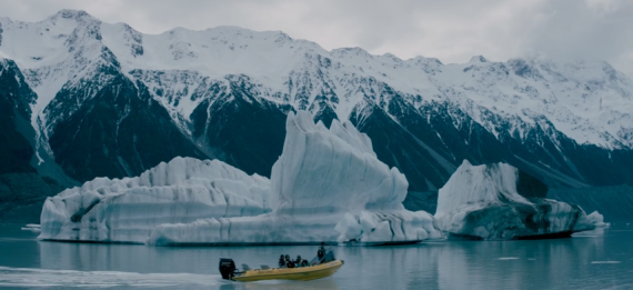 Small boat carries photographer Chris Burkard to a glacier