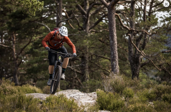 A man rides his E-mountain bike