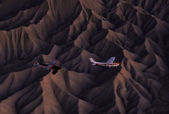 Aerial footage of two planes flying over the Southwest