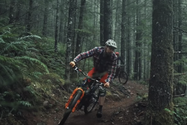 Mountain biker riding in a dense forest