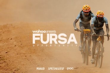 Two elite cyclists riding gravel bikes in East Africa