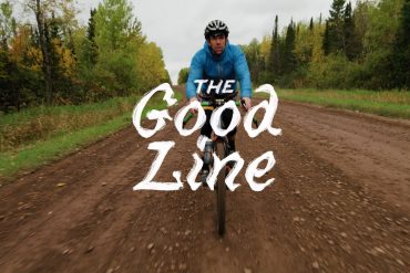 a man cycling a dirt trail