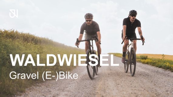 Two men riding Urwahn e-gravel bikes