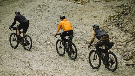 Three cyclists riding their Exploro Ultra bikes in Greece
