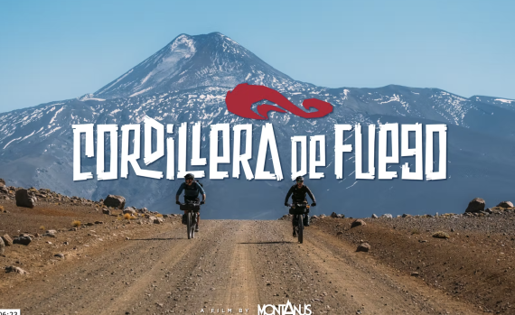 Two mountain bikers riding a dirt trail in Cordillera de Fuego