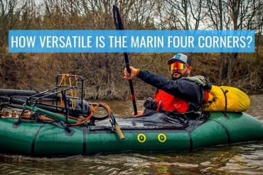 Man paddling his raft with his Marin Four Corners and gear.
