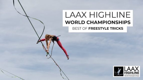 Female athlete on a Slackline in the Swiss Alps