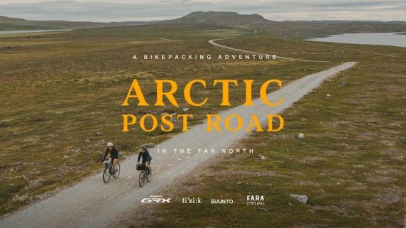 Two gravel cyclists on an open dirt road on the Arctic Post Road