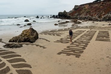 Bank of the West commissioned artist, Andres Amador, to create a sand billboard on a beach in Northern California
