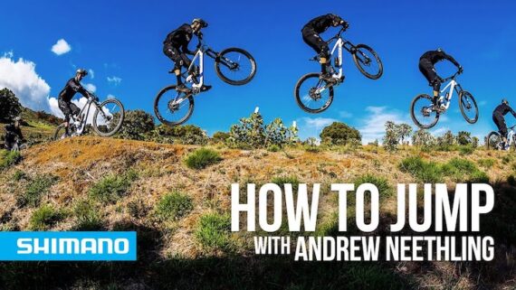 A pro cyclist showing us how to jump with your mountain bike.