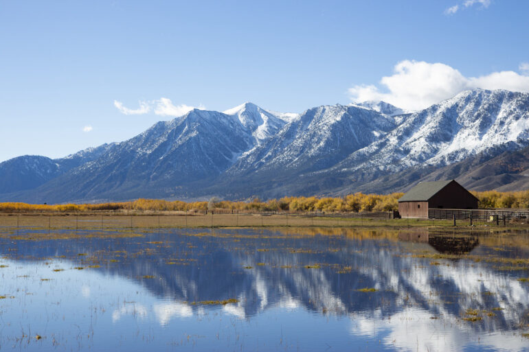 Landscape photo of Carson Valley, Nevada with the lake and mountains.