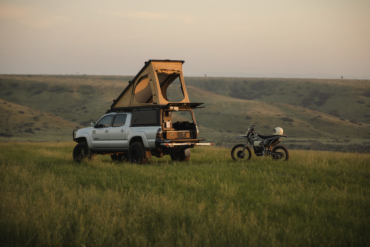 Super Pacific X1 Camper on a Toyota Tacoma with gear nearby